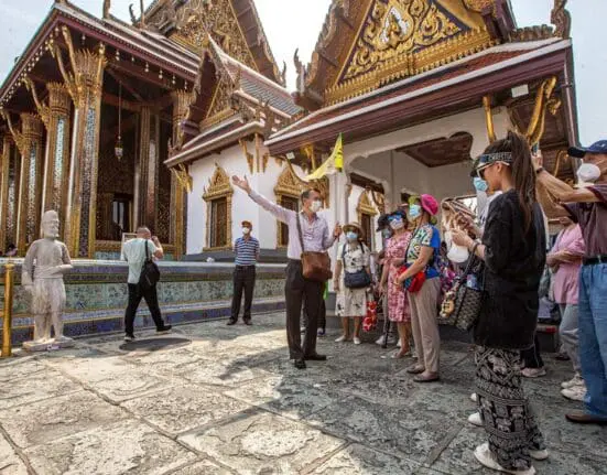 Thai Tourism Industry – Chinese tourists visit the Grand Palace scenic spot in Bangkok, Thailand, Feb. 7, 2022. (Xinhua/Wang Teng)