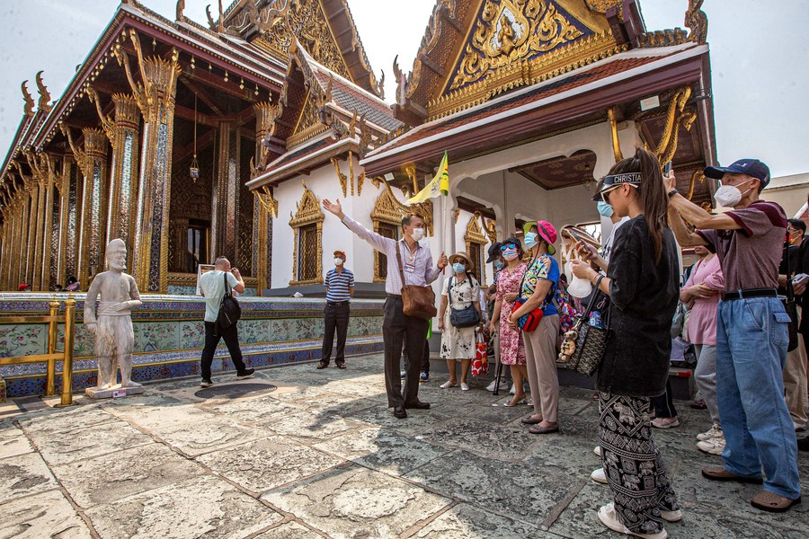 Thai Tourism Industry – Chinese tourists visit the Grand Palace scenic spot in Bangkok, Thailand, Feb. 7, 2022. (Xinhua/Wang Teng)