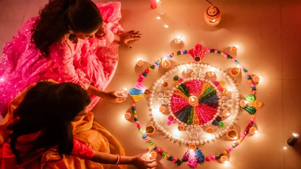 A picture of a beautifully decorated home with diyas, rangoli, and flowers, showcasing the true spirit of Diwali.
