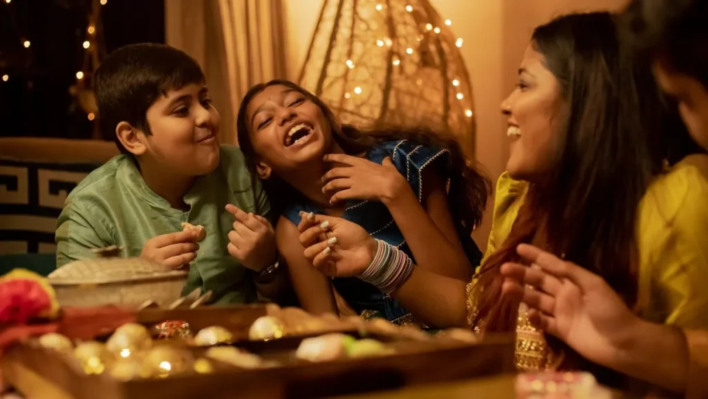 An image of a family sharing a laughter-filled moment during Diwali dinner, highlighting the warmth of family bonds.