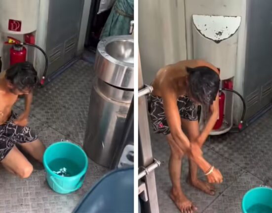 Video Gone Viral of Man Bathing in Moving Train, North Central Railway reacts