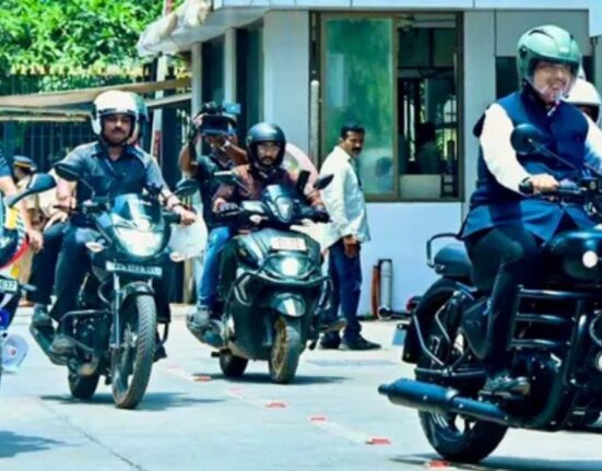 Maharashtra CM Fadnavis Rides Motorcycle to Assembly on Modi's Fuel-Saving Call