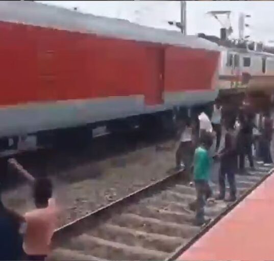 Passengers Pelt Stones at Poorva Express After Their Train Stalls